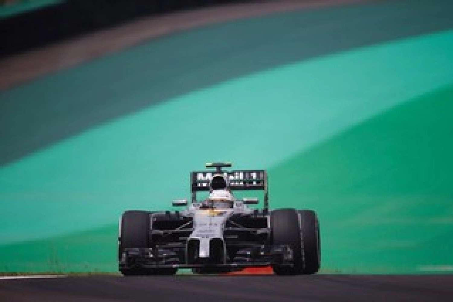 An “enhanced” car for McLaren in Abu Dhabi?