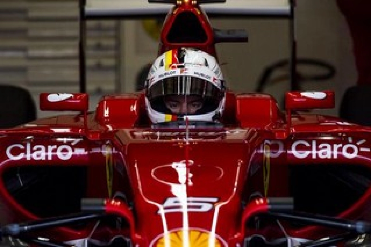 The ecstasy of victory for Sebastian Vettel and Ferrari