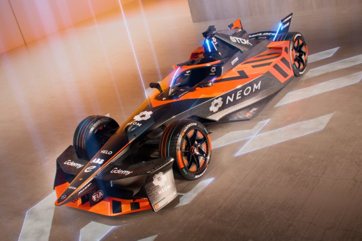 An orange papaya and black livery for McLaren in Formula E