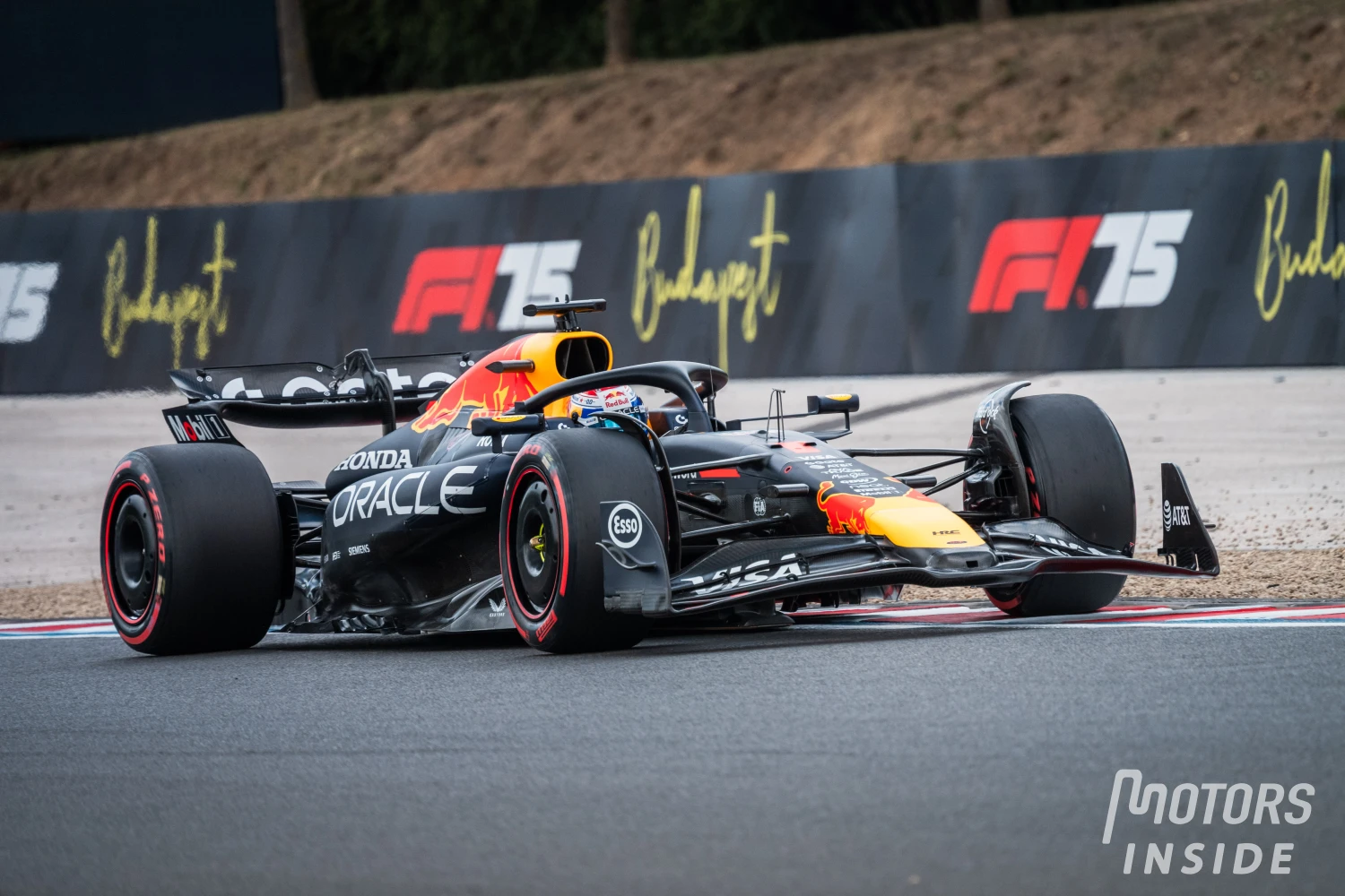 Max Verstappen receives a warning from the FIA after throwing a towel on the track
