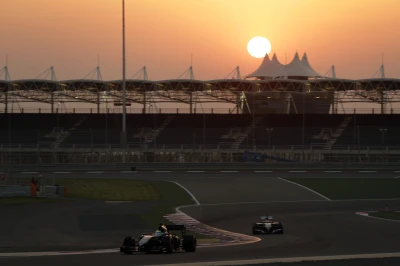 Track action while the sun is setting over the Bahrain International Circuit