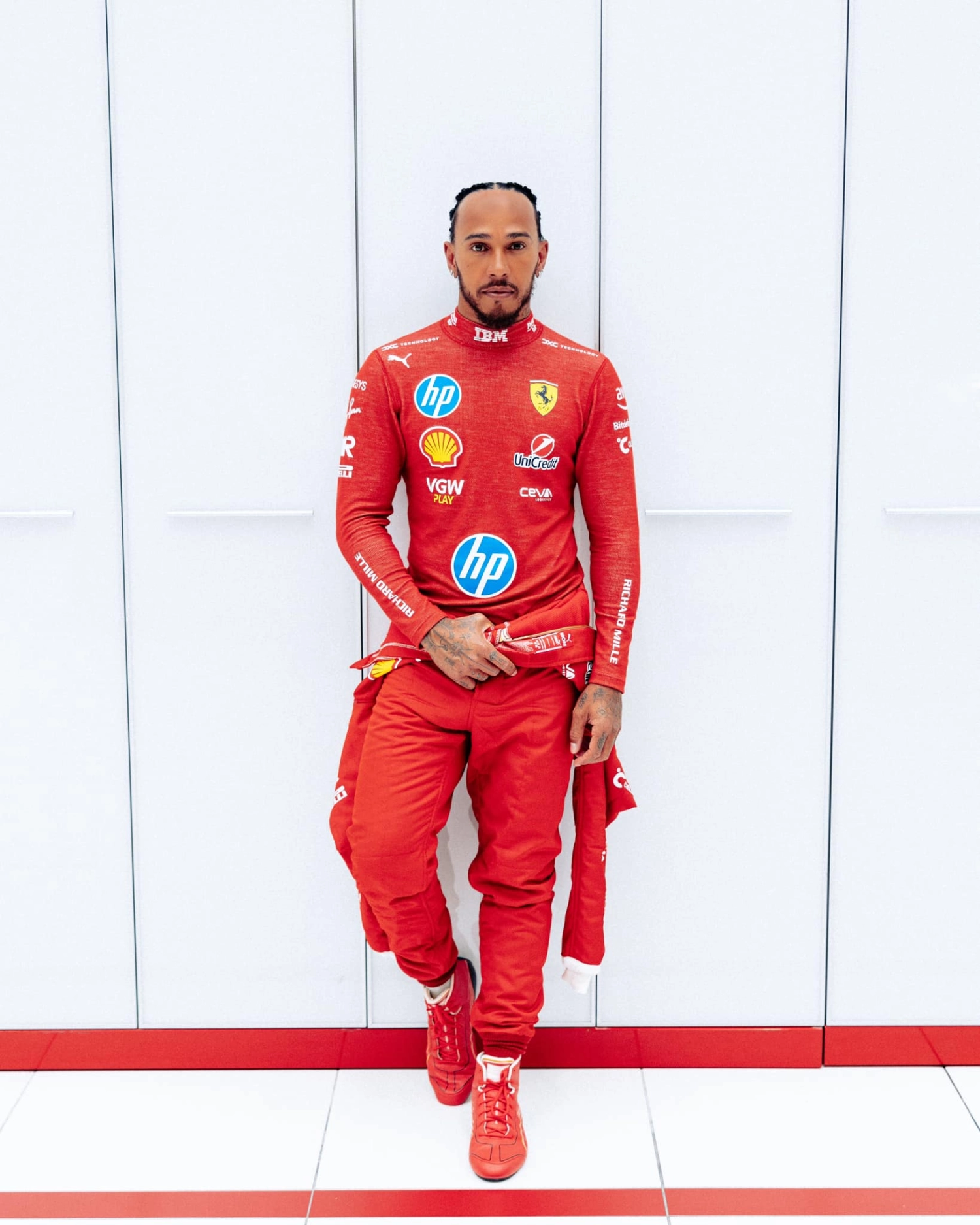Lewis Hamilton in Ferrari red suit